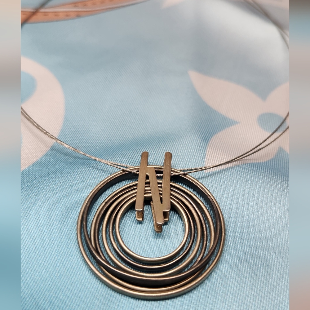 Modern NECKLACE on steel wire